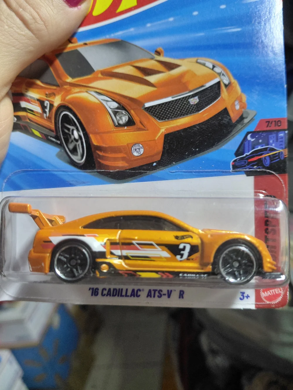 The Hot Wheels '16 Cadillac ATS-V R (orange, 90/250) is a 1:64 scale diecast car